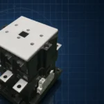 3TF series industrial AC contactor photographed on a dark navy blueprint grid background