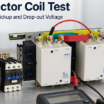 AC contactors on a test bench with a digital multimeter measuring coil resistance across A1 and A2 terminals